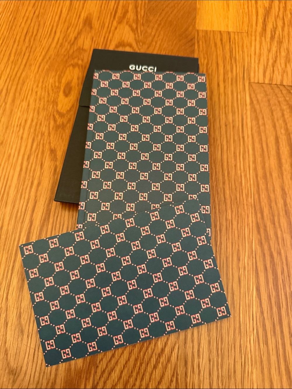 Gucci boutique notebook with stickers.